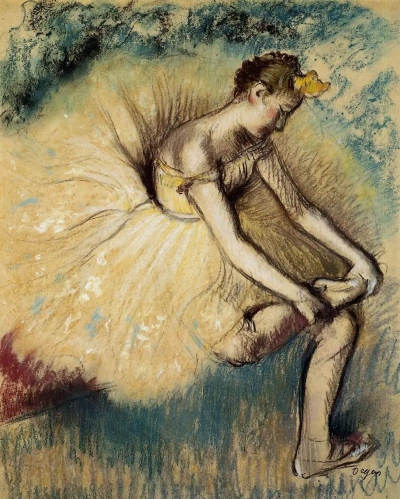 Bailarina colocándose el zapato