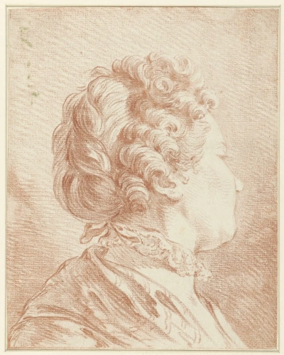 Cabeza femenina con cuello de encaje.