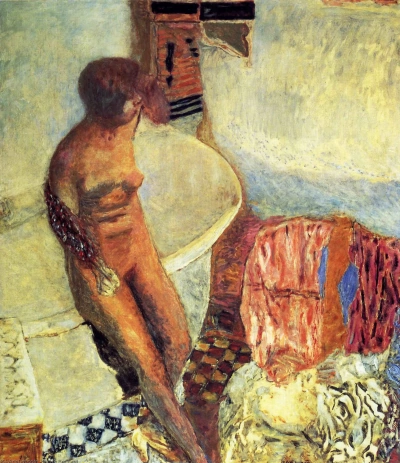 Desnuda alrededor de un cuarto de baño
