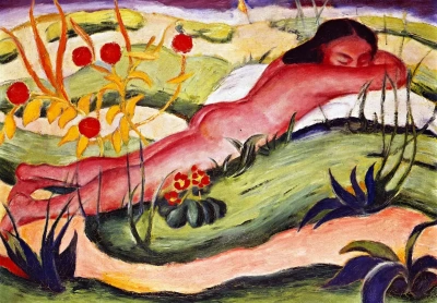 Desnuda tendida entre las flores
