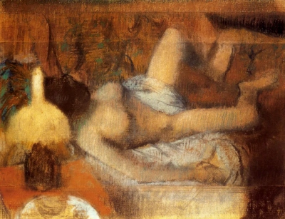 Desnudo en la cama
