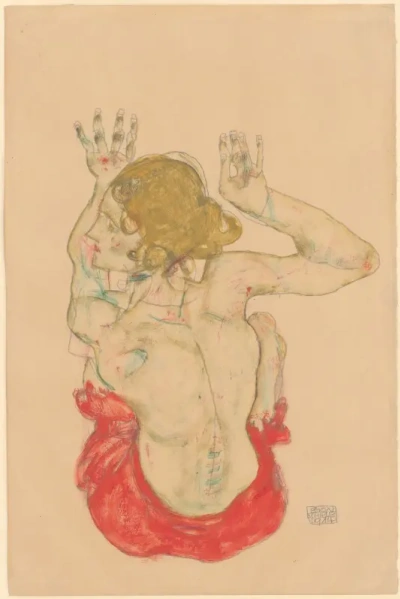 Desnudo sentado en una falda roja