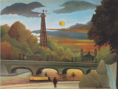 El Sena y la Torre Eiffel en la noche de sol.