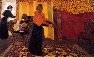 El interior rojo con cama de matrimonio (Baño de la suite)