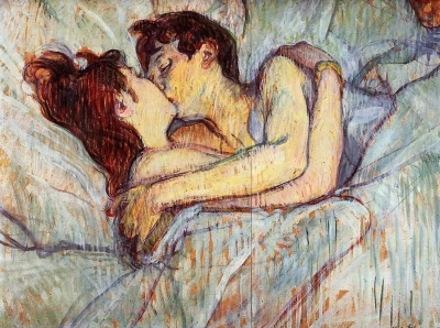 En la cama: beso