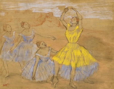 Grupo de bailarines en el escenario.