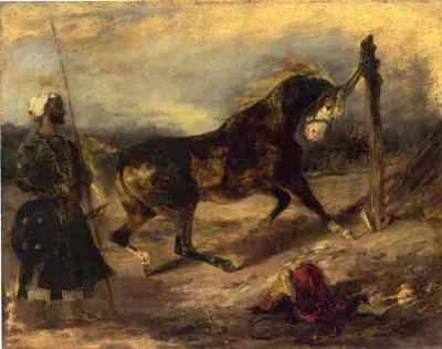 Guerrero al lado de un caballo atado.