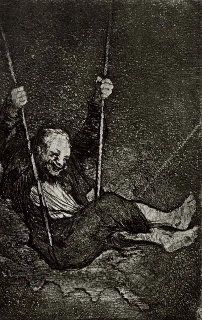 Hombre en un columpio