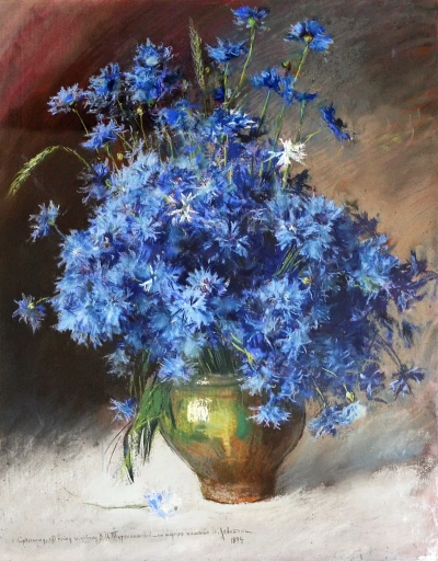 Jarrón con flores azules