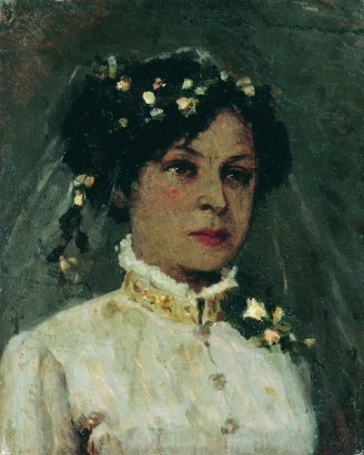 La esposa del artista en un vestido de novia.