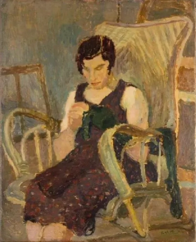 La mujer cose