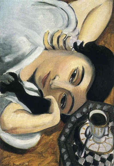 Lorette con taza de café