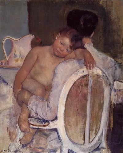 Madre con bebé en brazos.