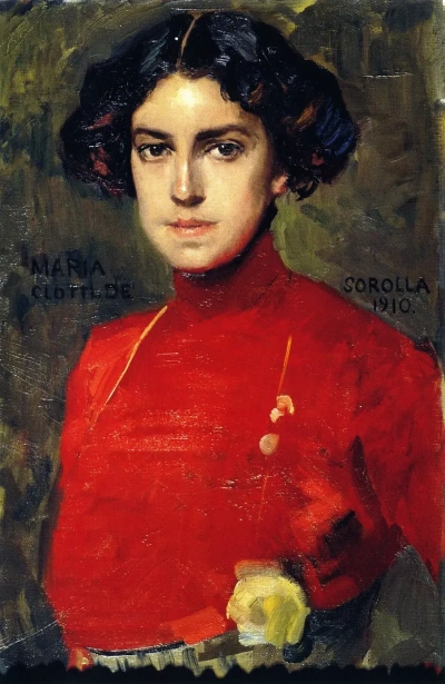 Maria en una blusa roja