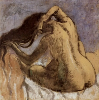Mujer desnuda peinándose