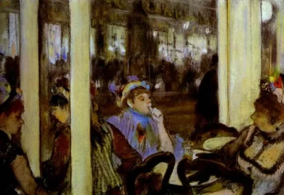 Mujeres en una terraza de café por la noche