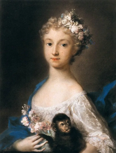 Niña con un mono