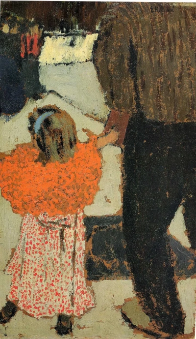 Niño con pañuelo rojo.