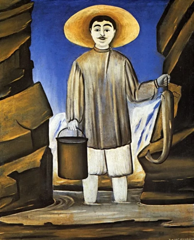 Pescador entre rocas.