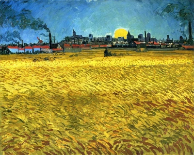 Puesta de sol: Campo de trigo cerca de Arles.