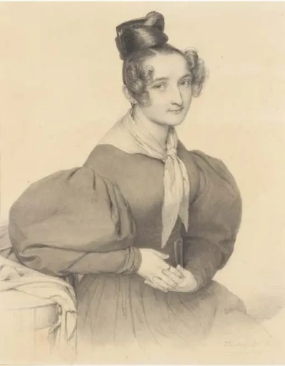 Retrato de la mujer joven sentada