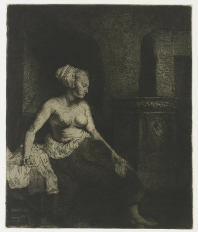 Semi-Nude at the stove.