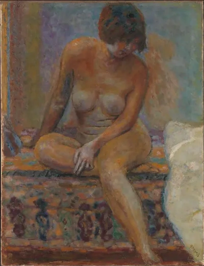 Sentada desnuda