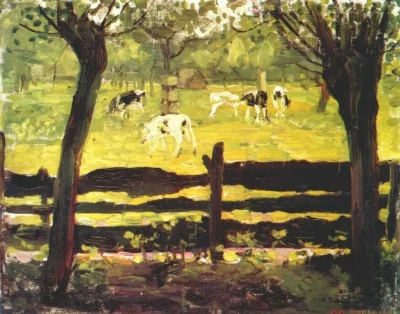 Terneros en un campo bordeado por sauces