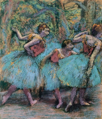 Tres bailarinas en tutús azul y corsés rojos.
