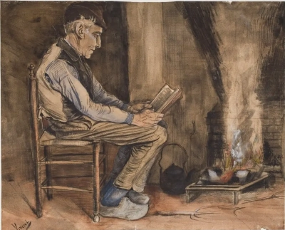 Un hombre leyendo en el hogar