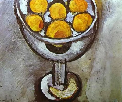 Un jarrón de naranjas