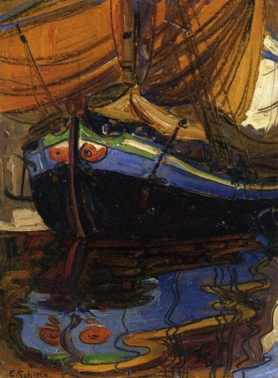 Velero reflejado en el agua.